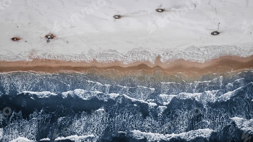 Preview: Boats on snowy beach in winter at Baltic Sea.