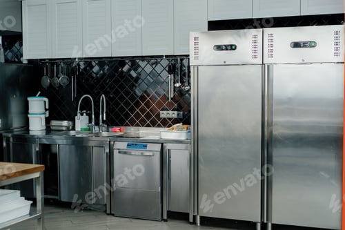 Preview: Professional commercial empty clean modern kitchen in restaurant kitchen equipment utensils