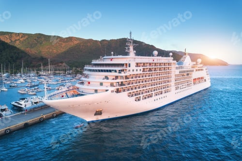 Preview: Aerial view of beautiful large white ship at sunset