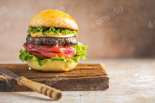Preview: Delicious juicy grilled burger on wheat buns. Studio macro shot.Food Feast Party.