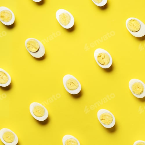 Preview: Food concept with boiled eggs pattern on yellow background. Top view. Creative pattern in minimal