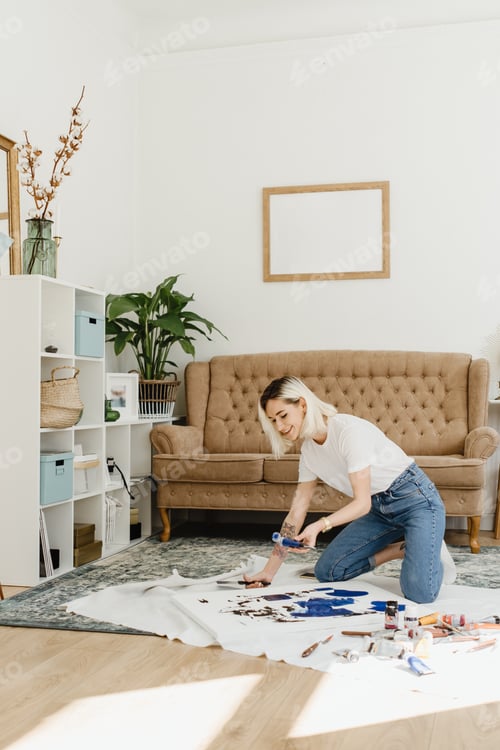 Preview: Beautiful young woman artist drawing