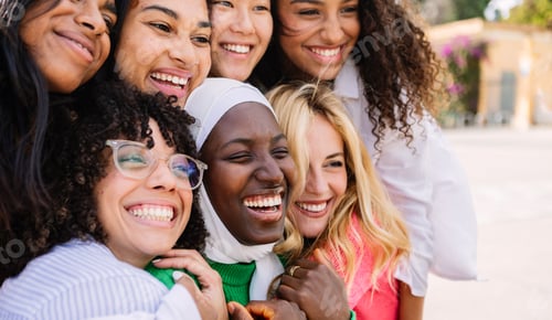 Preview: Diverse group of women having fun together outdoors.