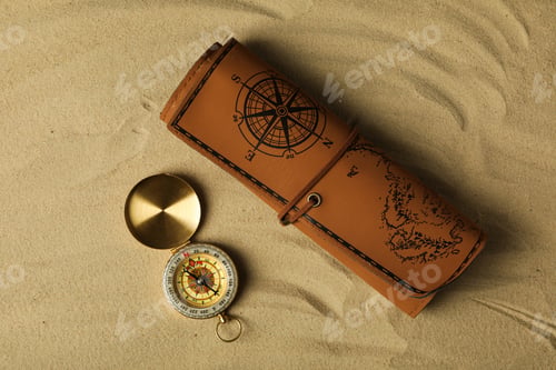 Preview: Sea travel concept. Vintage compass on the sand