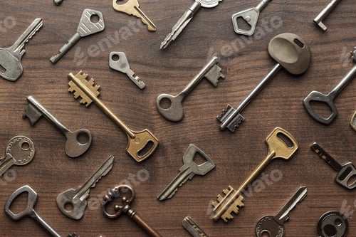 Preview: Many Different Keys On Wooden Table