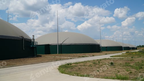 Preview: Biogas. Modern bio comlex. Renewable energy from biomass. Innovative biogas plant among green nature