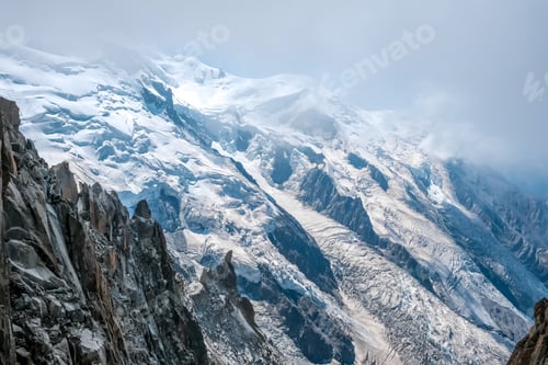 Preview: Spectacular mountain crags between glaciers in the alps.
