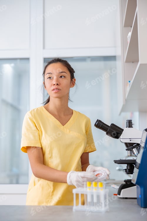 Preview: Laboratory assistant is conducting research in clinic