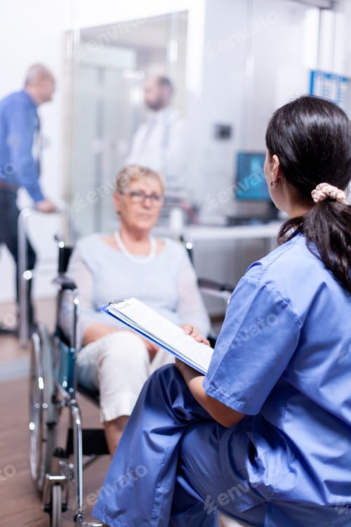 Preview: Nurse talking with handicapped