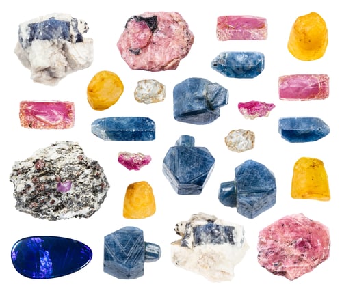 Vista previa: various samples of raw corundum minerals isolated