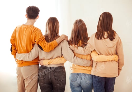Preview: Unrecognizable friends hugging each other