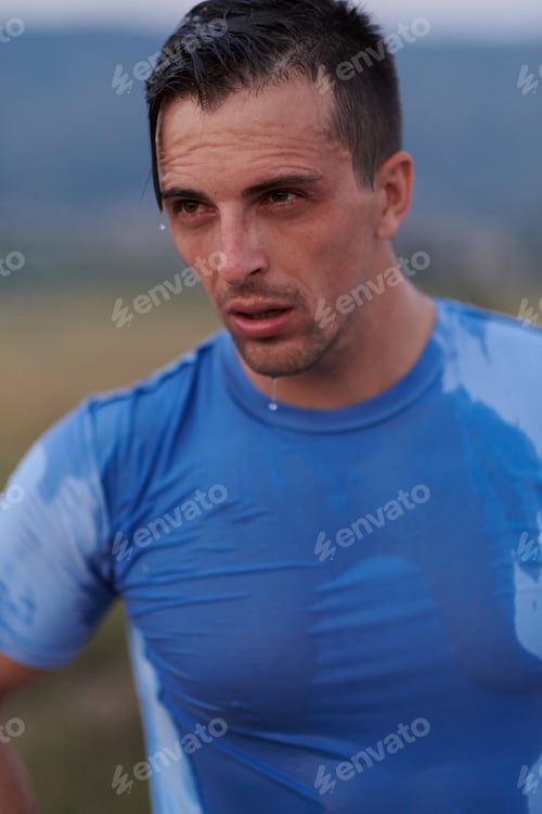Preview: Post-Run Repose: Sweaty Athlete Rests After Intense Daily Run.