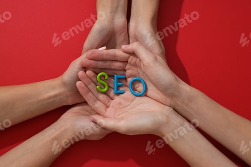 Preview: Letters SEO in hands on red background, top view