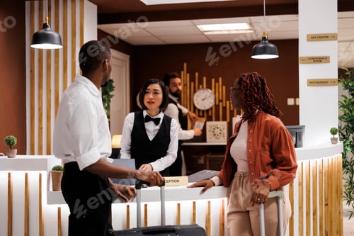 Preview: Hotel employee registering people