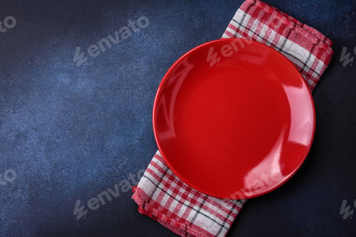 Preview: Round empty colored ceramic plate on concrete texture background