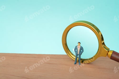 Preview: The businessman carefully examines the intricate details of his financial strategy
