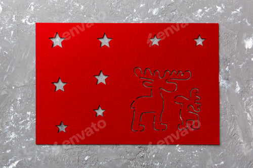 Preview: Top view of red tablecloth for food on cement background. Empty space for your design