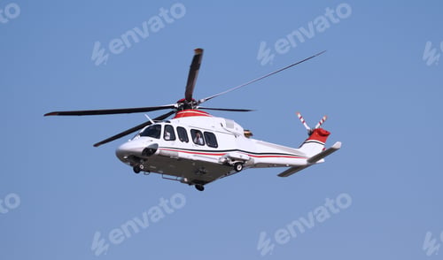 Aerial View of Sleek White and Red Helicopter