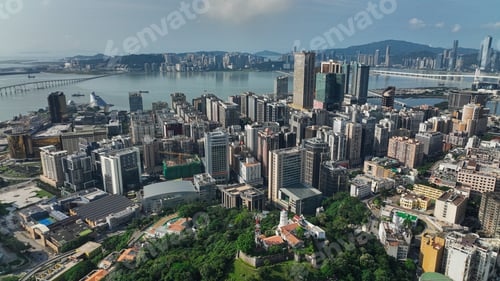 Preview: Aerial View of City With Bridge in Background