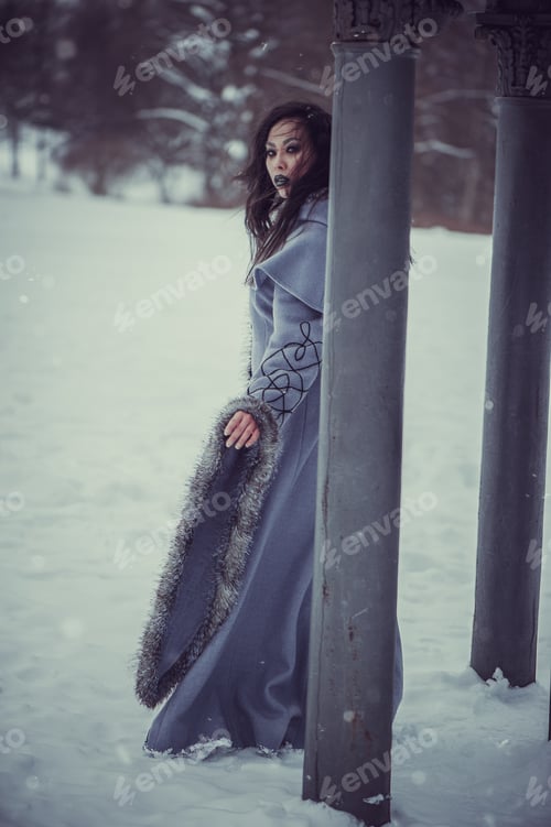 Preview: Fairytale Of Young Woman Dressed In Long Sleeved Coat At Winter With Snow Outdoors