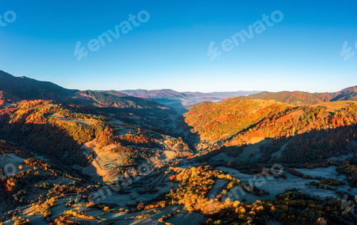 Preview: Highlands and hills with terracota forests under blue sky