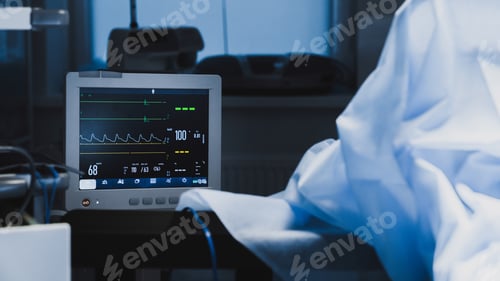 Preview: Electrocardiogram in hospital surgery operating emergency room showing patient heart rate