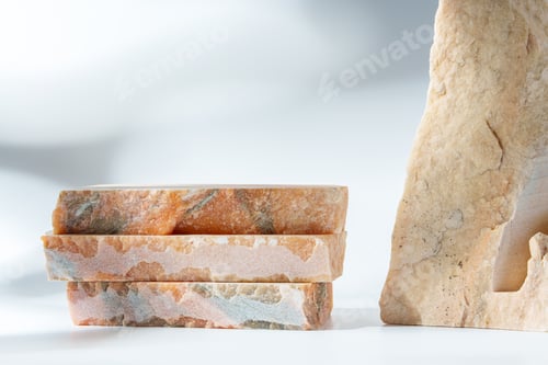 Preview: Piece of granite stone on white background with shadows