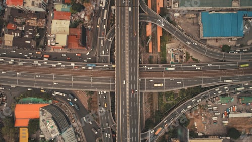 Preview: Top down of downtown traffic road at cityscape urban scene aerial view. Car park at high buildings