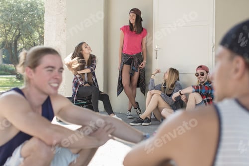 Preview: Friends talking and standing outside building