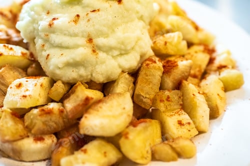 Preview: Yuca fried with hummus sauce.