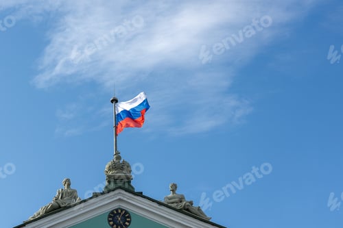 Preview: Statues and Flag on Building Under Blue Sky