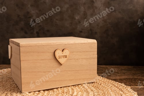 Preview: Wooden gift box on a sisal fabric on a table - Valentine, love