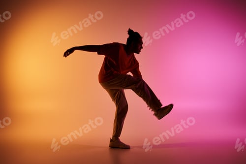 Preview: Young dancer in motion on a gradient background