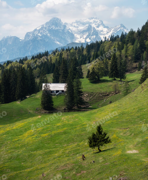 Preview: Mountains and the cottage on the meadow