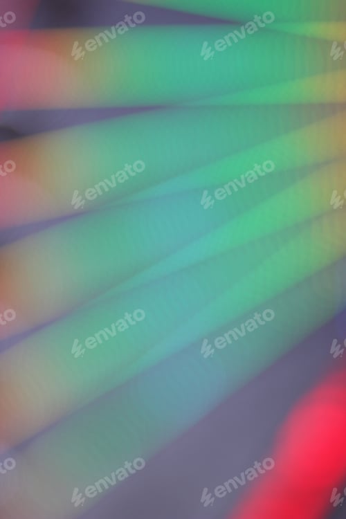 Preview: Blue, Red, Yellow, Blue, White Blurred Festive Bokeh Background With Stars For Christmas