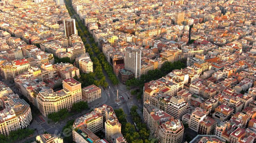 Preview: Barcelona city skyline, aerial view. Eixample residential district at sunrise. Catalonia, Spain