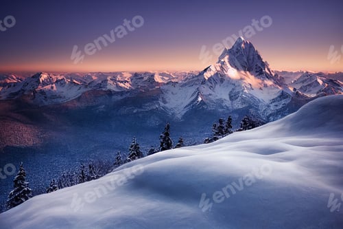 Preview: Landscape of icy mountains and forest at sunset in Antarctica