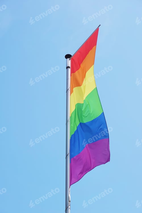 Preview: vertical rainbow or lgbtq pride flag on flagpole