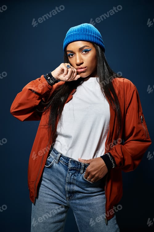 Preview: A young woman showcases her unique autumn style in a cozy indoor setting during the afternoon