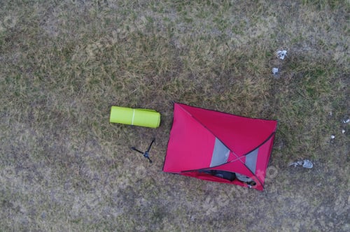 Preview: Group of people enjoying tent camping in mountains