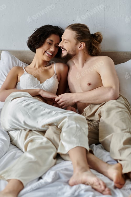 Preview: Couples Intimate Morning Laughter In Bed