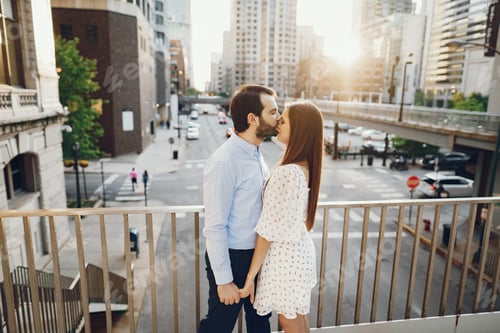 Preview: elegant couple in a city