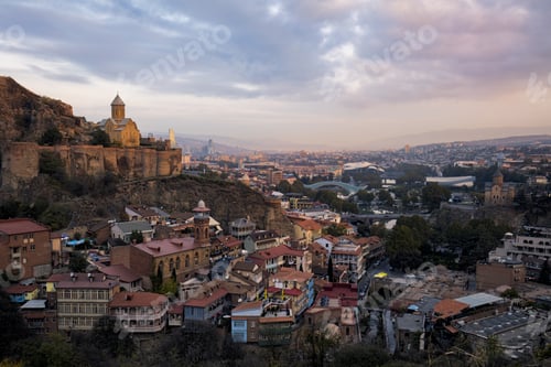 Preview: High angle shot of a sunrise scenery in Tbilisi, Georgia in autumn