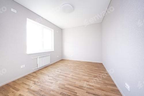Preview: Bright gray and white room with wooden floor.