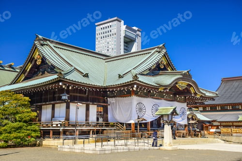 Preview: Tokyo, Japan - March 23, 2014: A Security Guard Stands At The Entrance To Yasukuni Shrine. The
