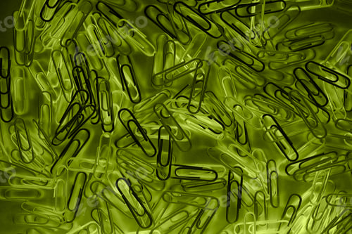 Preview: Paper Clips Office Supplies Lie On A Bright Background