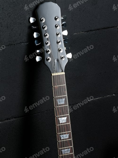 Preview: Electric guitar head isolated on black background