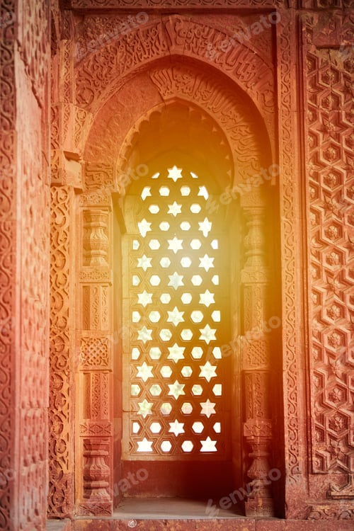 Preview: Decorative window shutters of Alai Darwaza landmark part of Qutb complex in South Delhi, India,