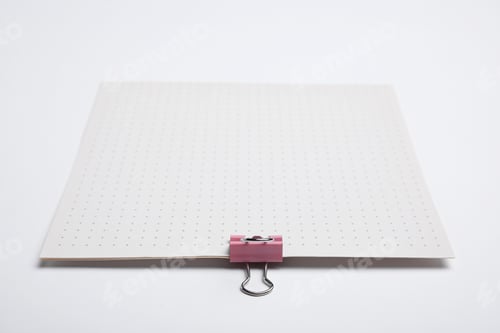 Preview: Sheets of paper with clip on white background