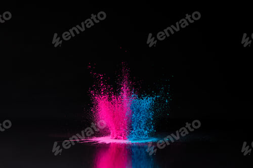 Preview: pink and blue holi powder explosion on black, traditional Indian festival of colours